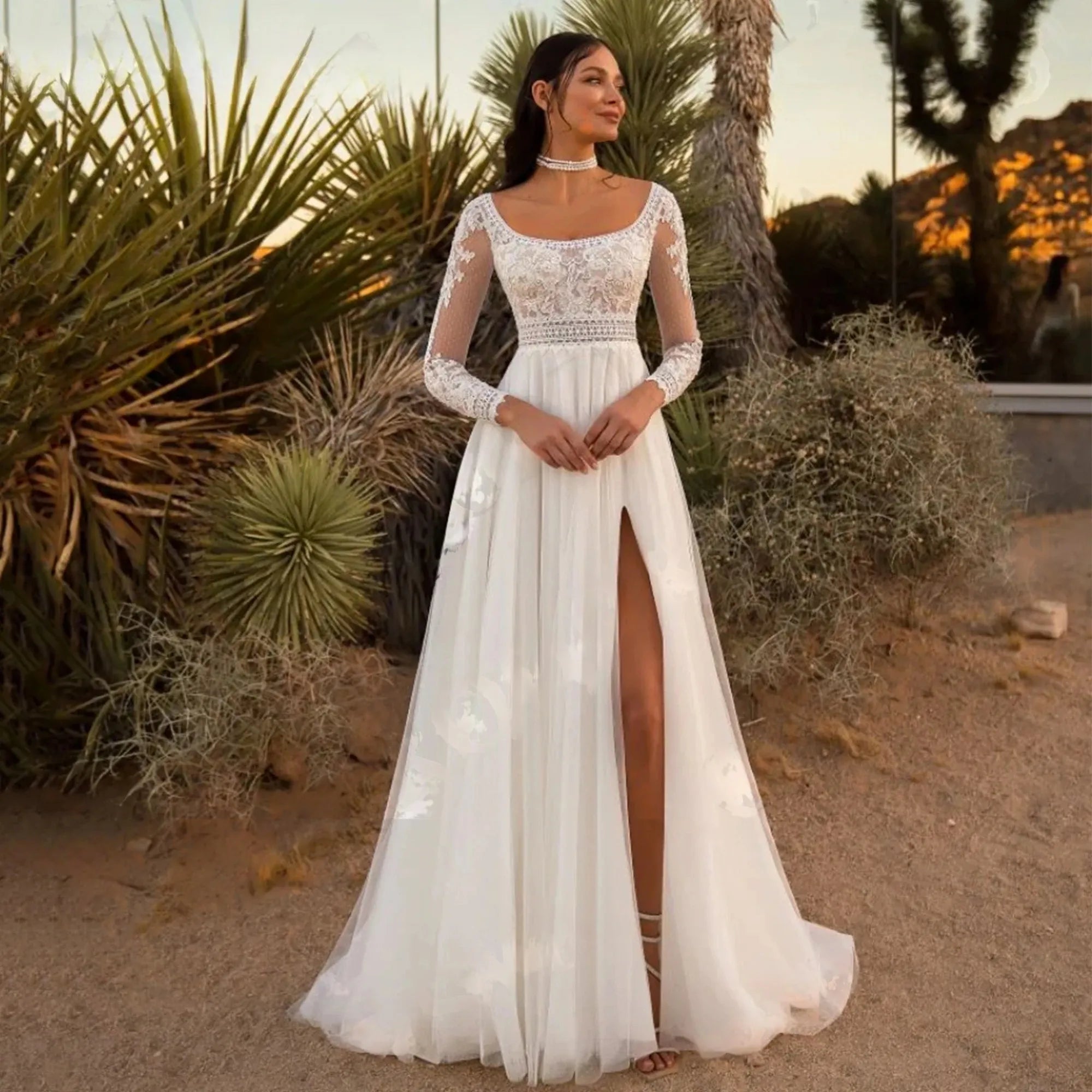 Robe de mariée bohème en ligne avec dentelle légère, décolleté en V et jupe fluide pour un style romantique et naturel.