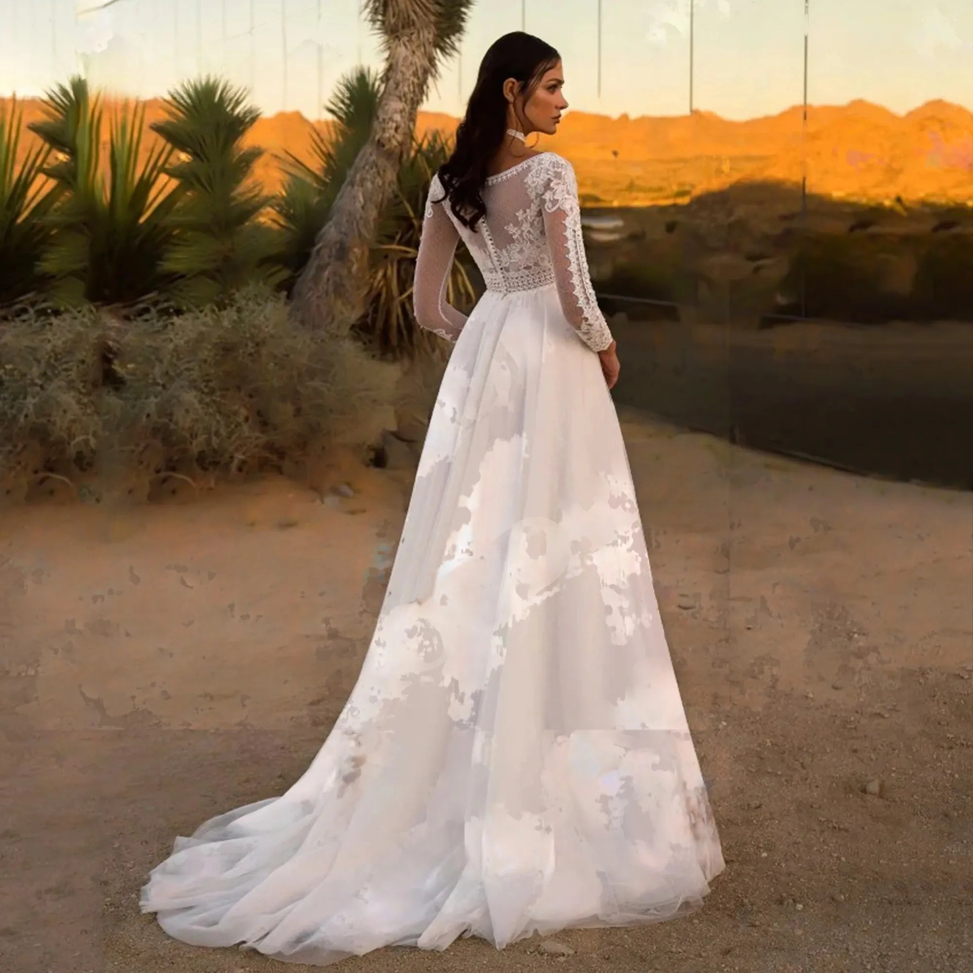 Robe de mariée bohème en ligne avec dentelle fluide et détails romantiques, idéale pour un mariage champêtre.