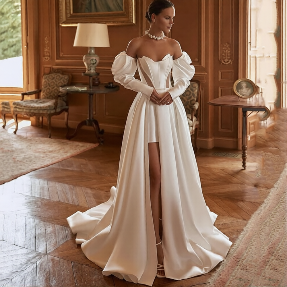 Robe de mariée courte devant longue derrière de la marque Robe de mariée Paris, vêtement blanc avec détails élégants.