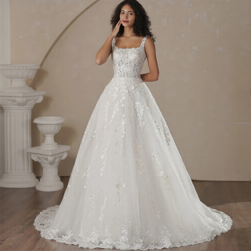 Robe de mariée fleur de la marque Robe de mariée Paris, détail de la broderie florale et du tissu élégant.