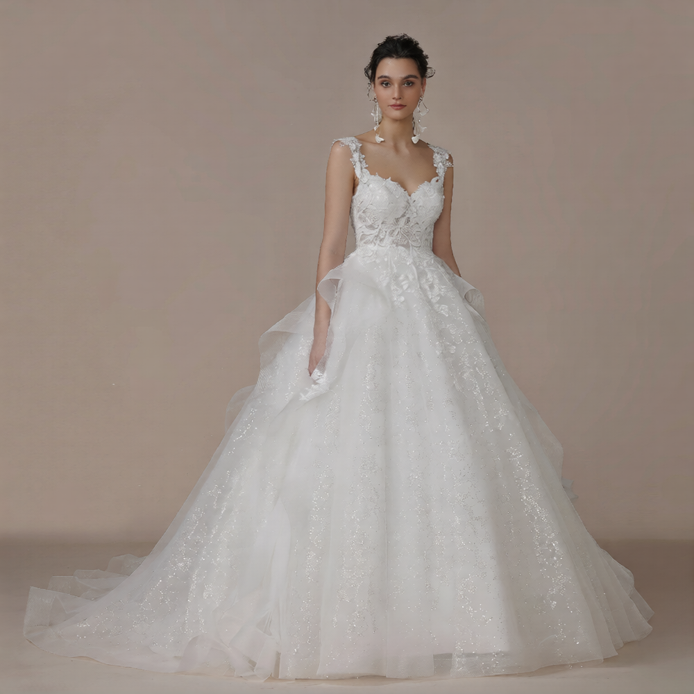 Robe de mariée en mousseline de soie, élégante et fluide, conçue par Robe de mariée Paris, vue de face sur un fond neutre.