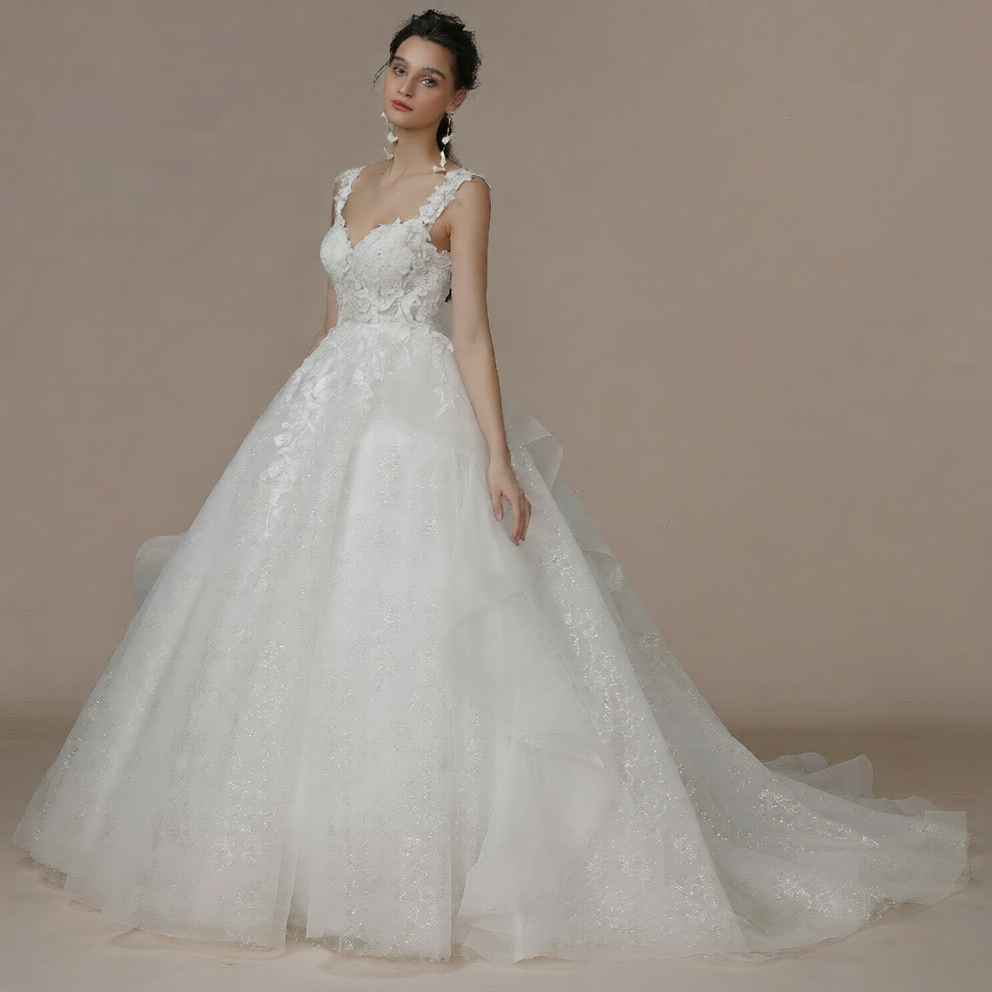 Robe de mariée en mousseline de soie de Robe de mariée Paris, vue de près avec détails élégants et tissu fluide.