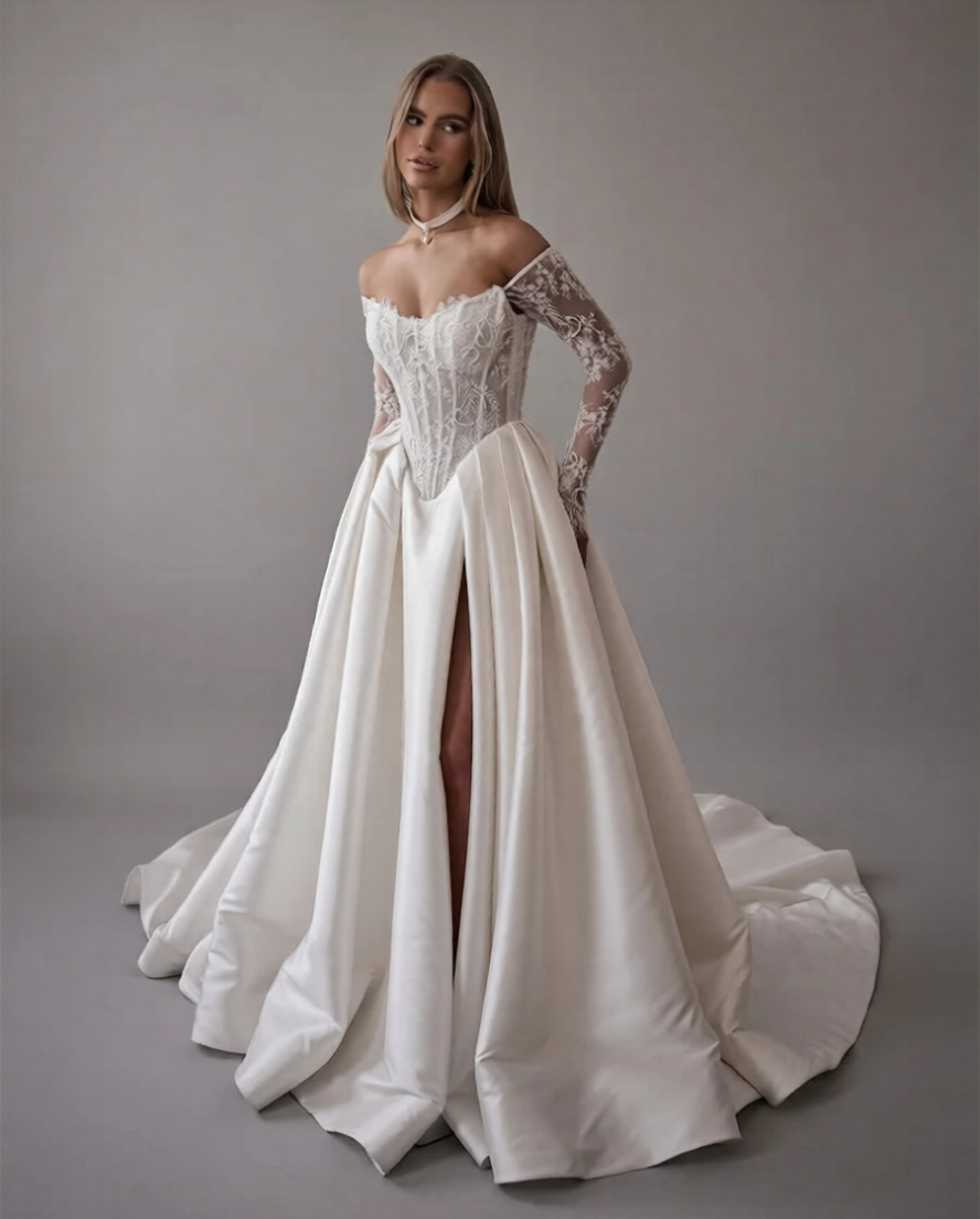 Robe de mariée élégante de la marque Robe de mariée Paris avec dentelle et décolleté en V, portée par un mannequin.