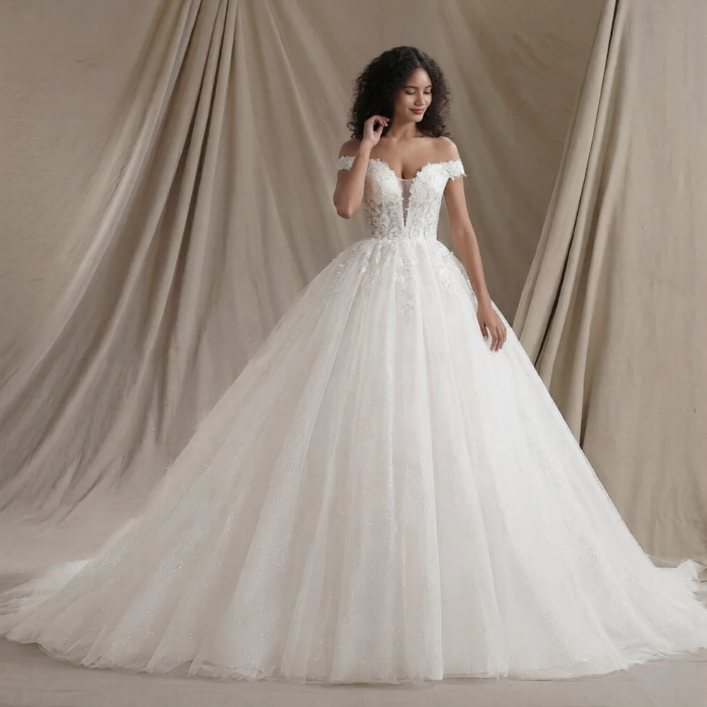 Robe de mariée romantique de la marque Robe de mariée Paris, longue avec dentelle et jupe fluide pour mariage élégant.