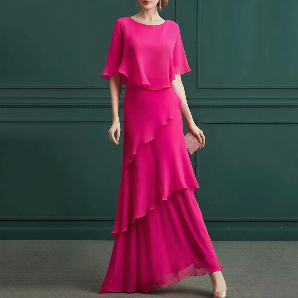 Robe mère de la mariée blanche avec broderies délicates et manches longues, élégante création de Robe de mariée Paris.
