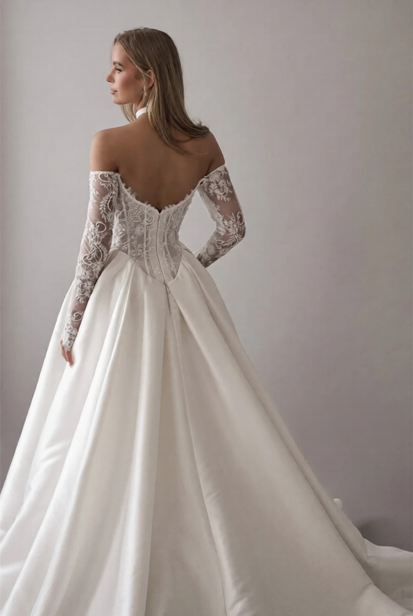 Robe de mariée élégante de la marque Robe de mariée Paris, avec dentelle blanche et décolleté en V.